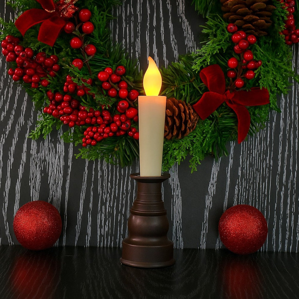 Close-up of premium decorative LED candle flame and classic holder