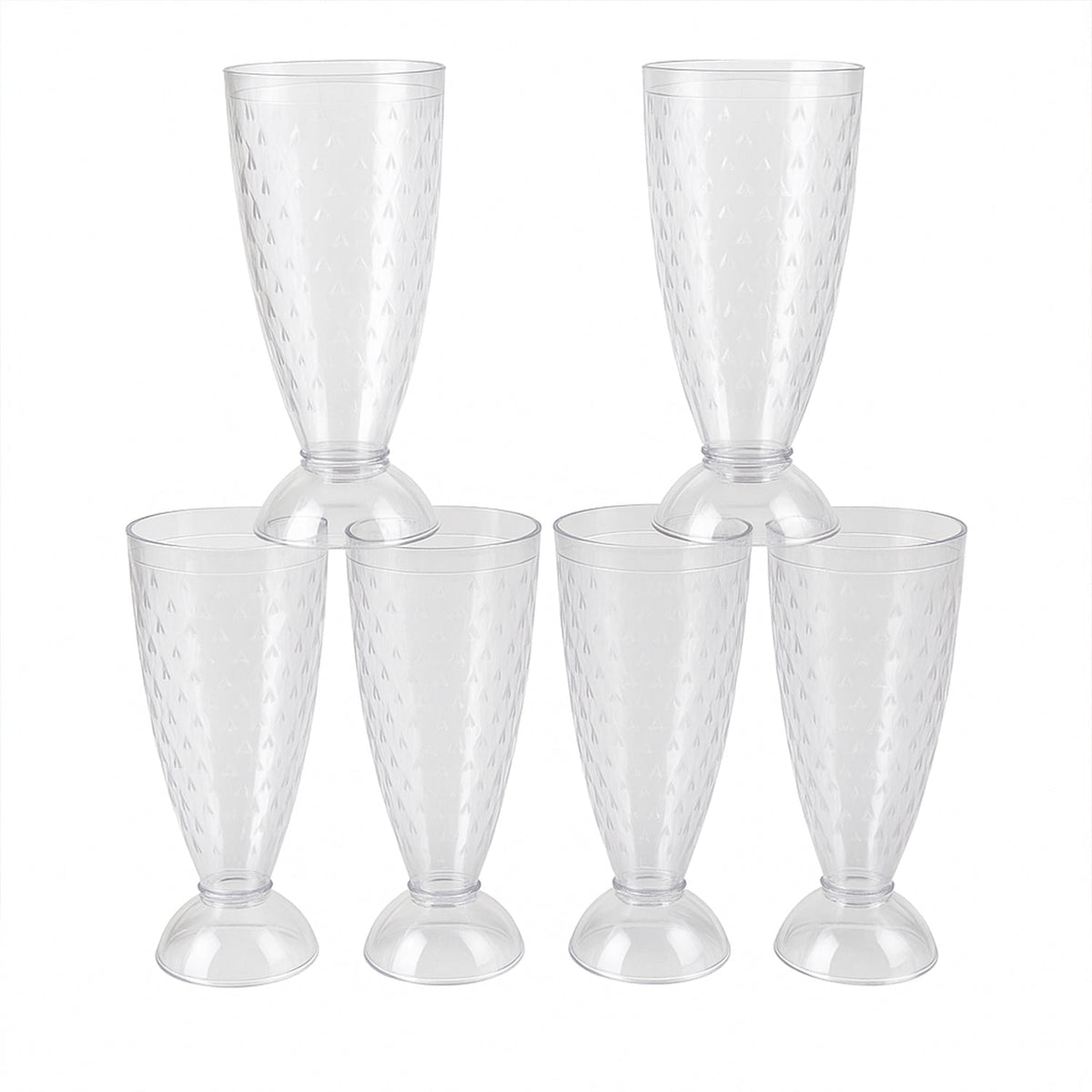 Transparent plastic milkshake glasses neatly arranged on a dining table
