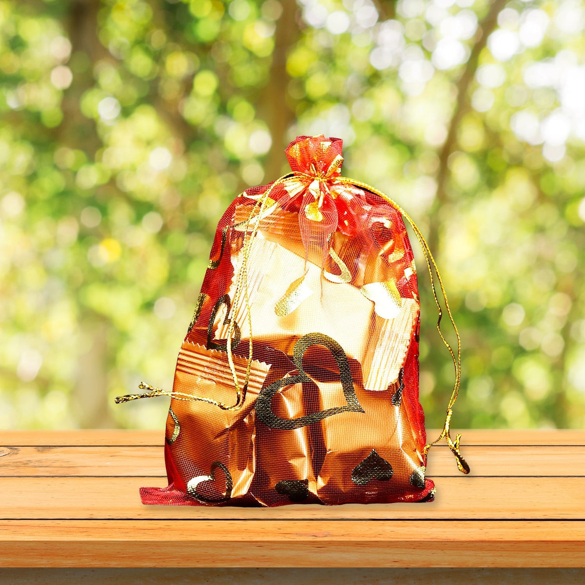 Transparent net fabric Shagun Potli bag with drawstring, ideal for dry fruits.