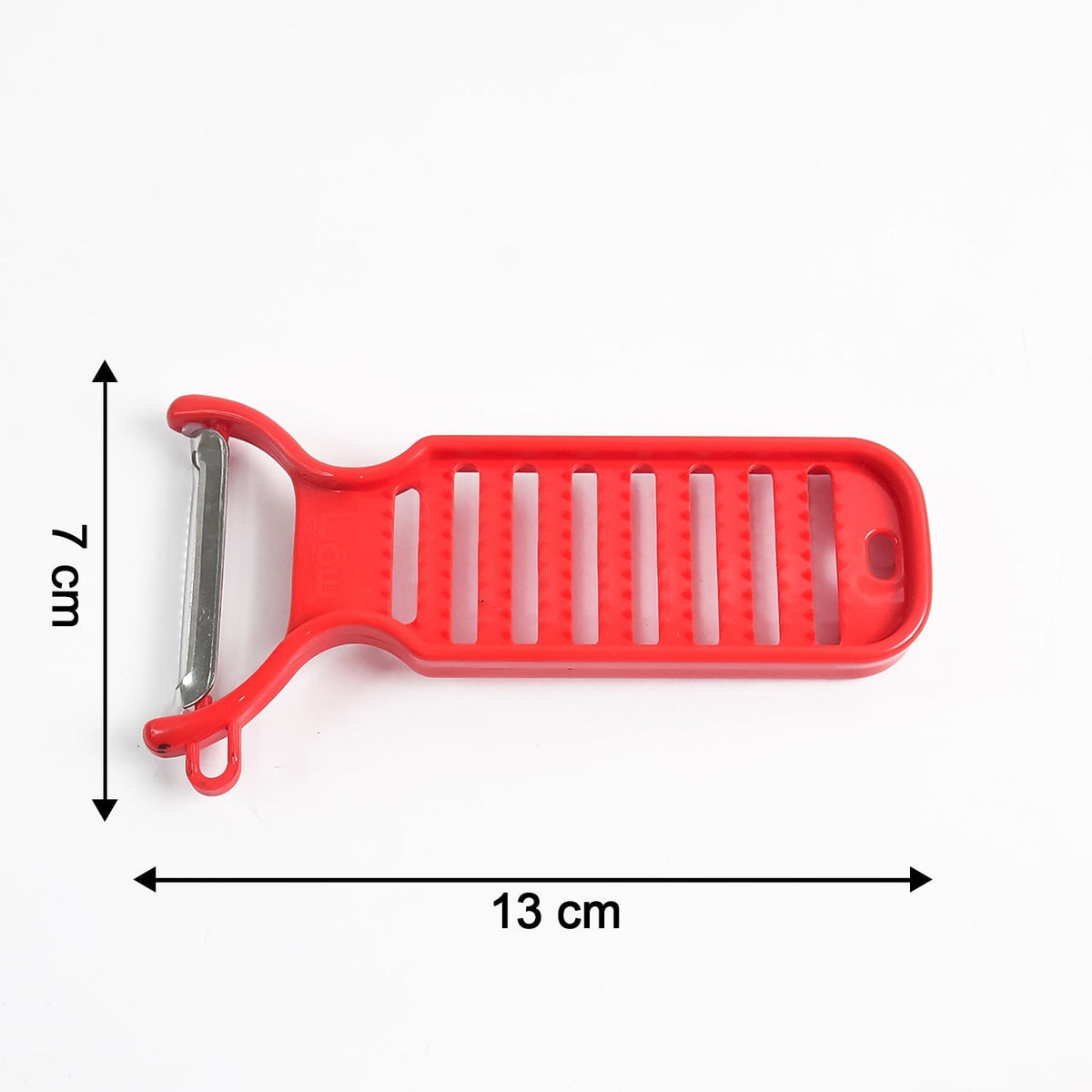 Close-up view of stainless steel grater and peeler for ginger