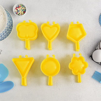 Multi-shape plastic cookie cutter moulds in various bright colours for dough and fondant shaping.