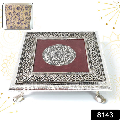 Elegant silver square pooja bajot featuring a detailed mandala engraving for sacred rituals.
