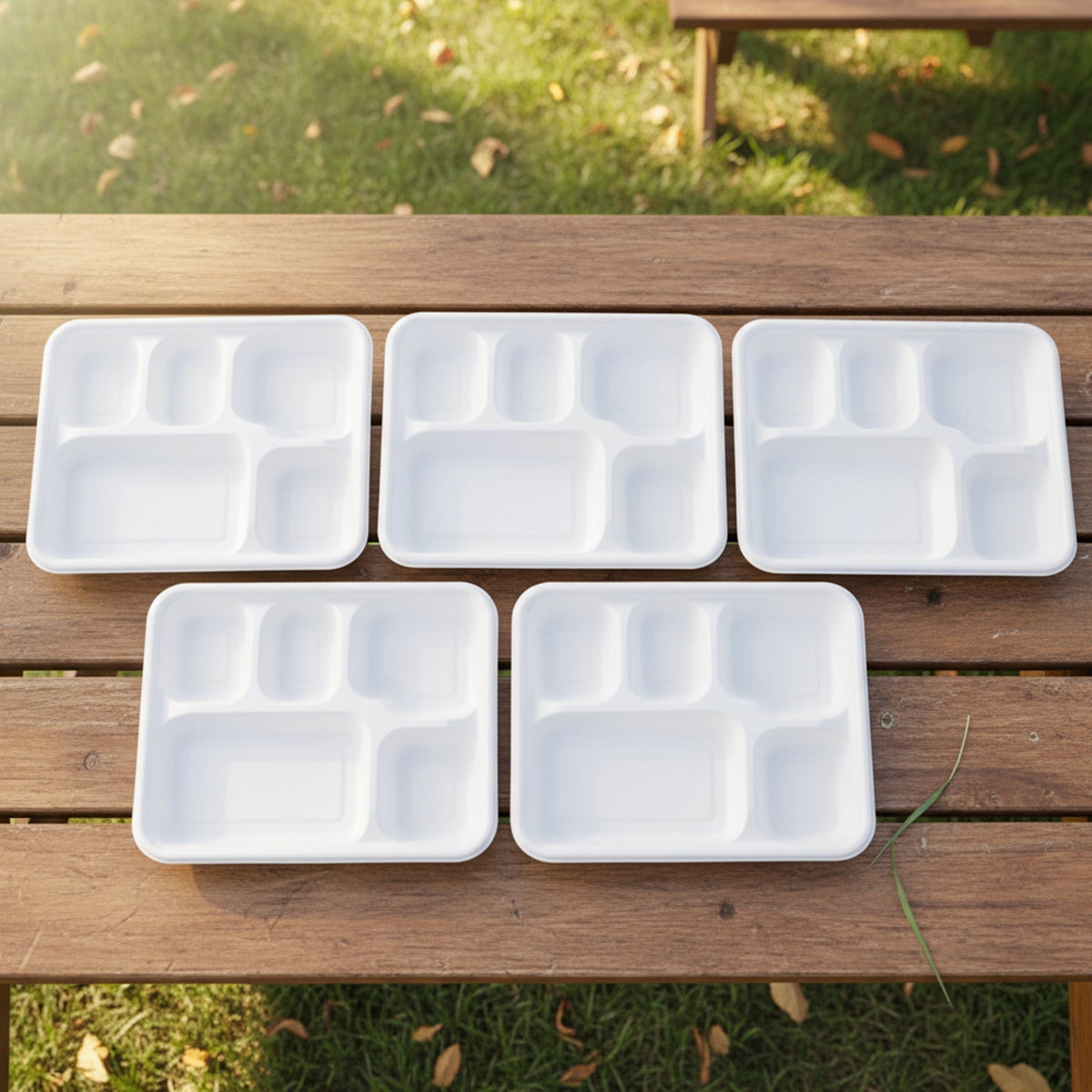 Close-up showing smooth food-safe surface of compostable bagasse meal tray
