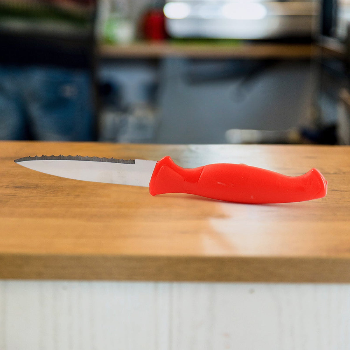 Close-up of stainless steel serrated blade for vegetable cutting