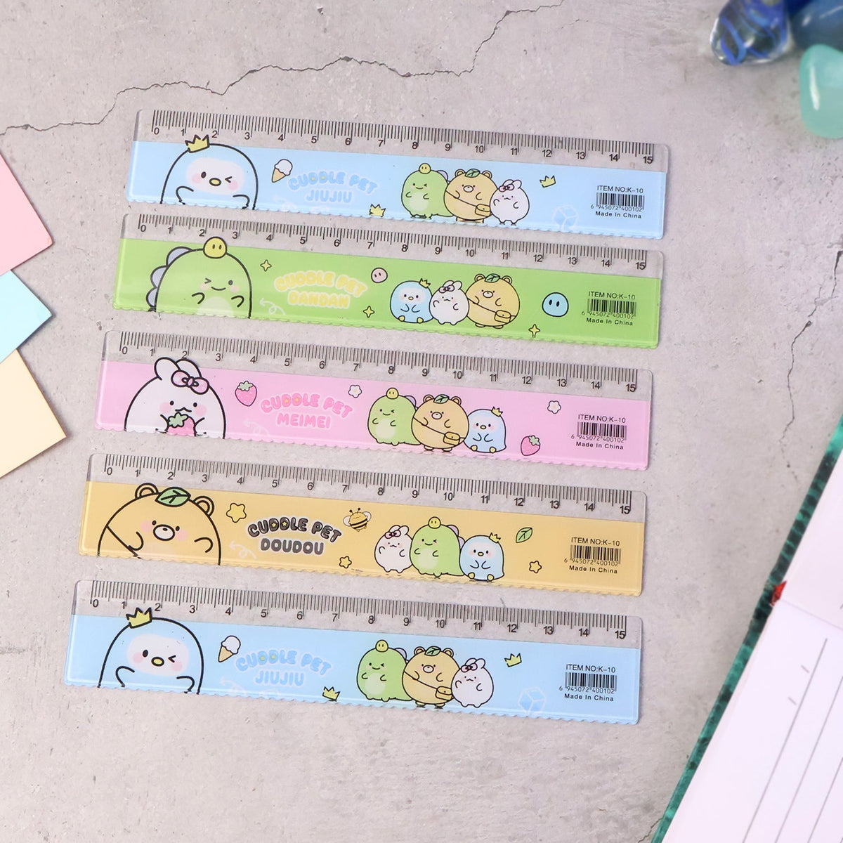 Pack of five plastic rulers with cartoon designs for kids