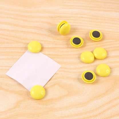 Side profile of a white round magnet, highlighting its compact and sleek design.
