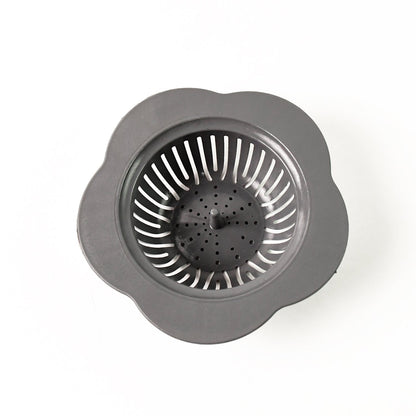 Flower-patterned plastic kitchen sink strainer for trapping debris