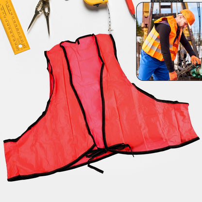 A bright fluorescent yellow high visibility safety vest with tie closures, folded neatly on a white background.