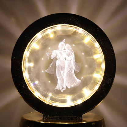 Golden base Radhe Krishna decorative lamp emitting soft ambient LED light