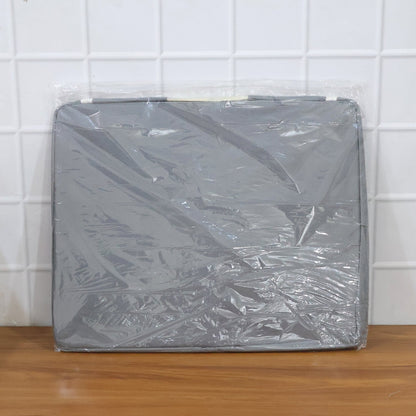 Close-up of the durable double zipper and reinforced handle on the foldable storage bag.