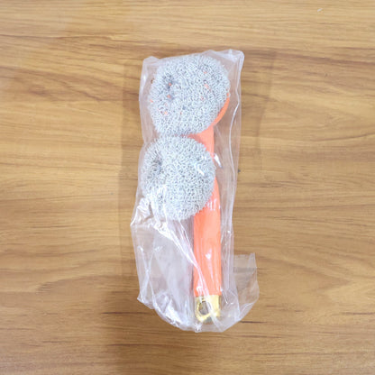 Heavy duty scrubber brush in use removing stubborn stains
