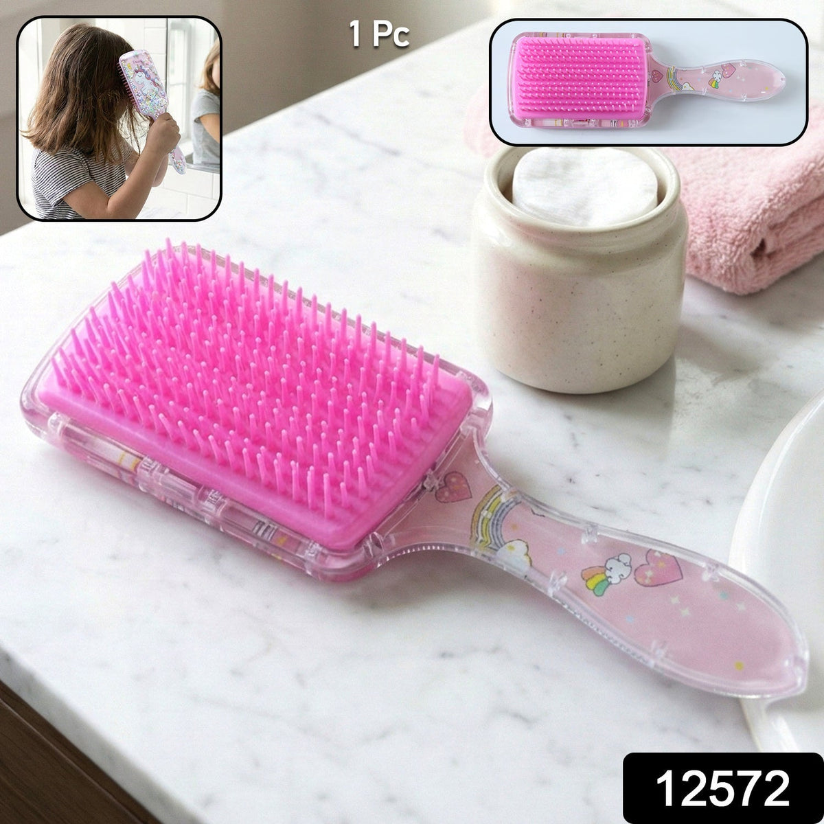 Kids hairbrush showing soft bristles and printed design