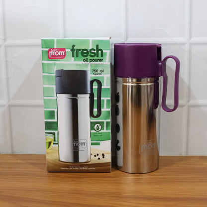 Close-up image of oil pourer spout designed to prevent drips and spills