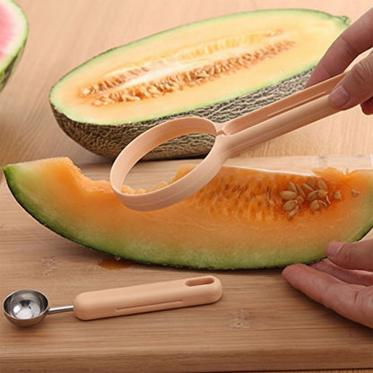 Side view of ergonomic handle on fruit scooper and cutter tool