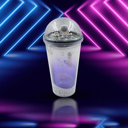 The double-wall plastic astronaut tumbler with its LED light on, displayed against a plain background.