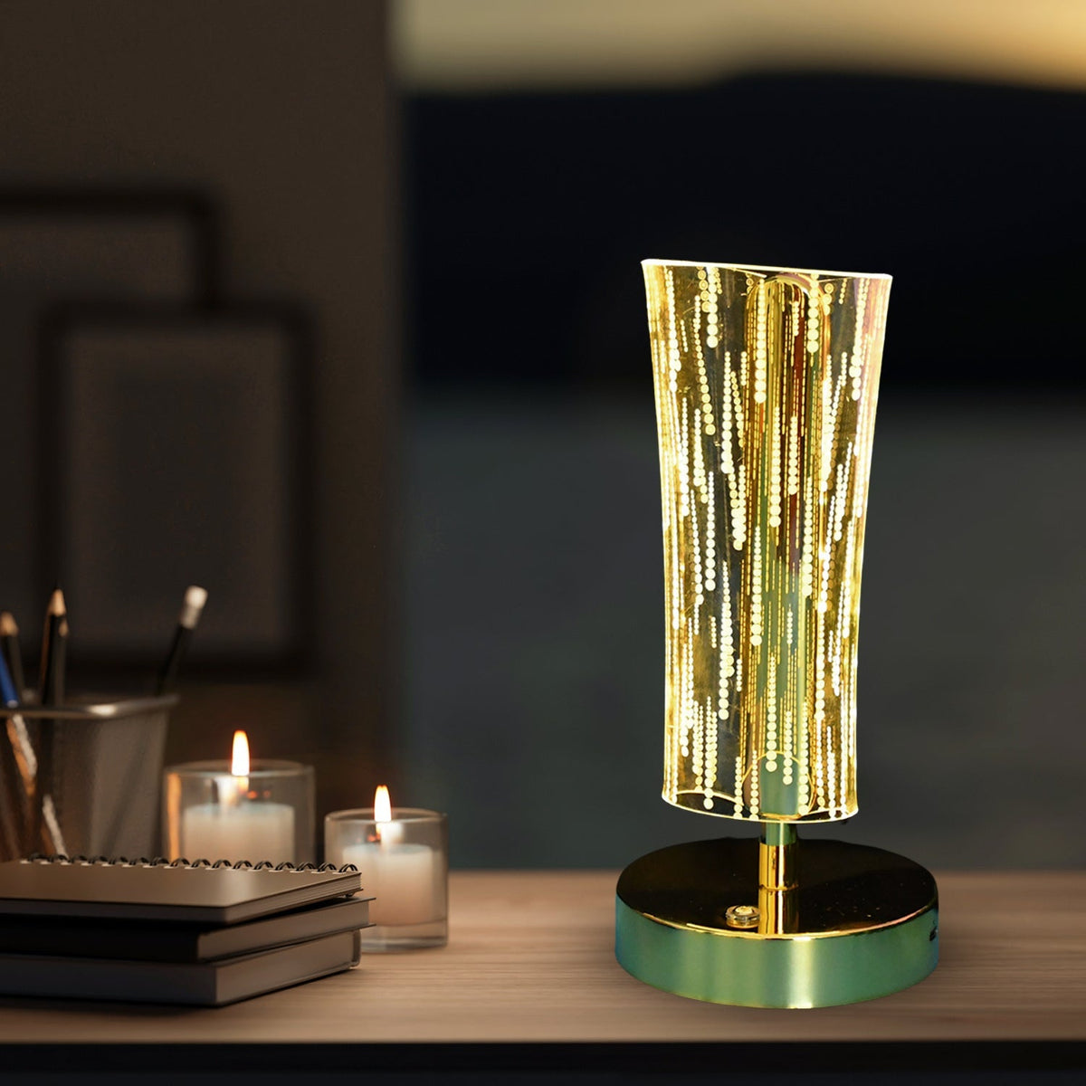 Close-up of crystal table lamp showing detailed LED light effect and golden base