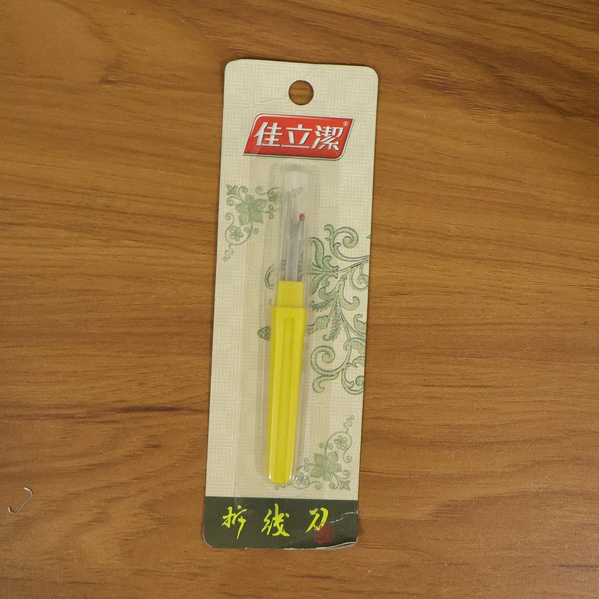 Sewing accessory, a precision thread remover seam ripper for various crafts.