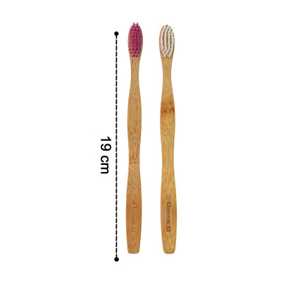Single bamboo toothbrush on plain white background showcasing eco design