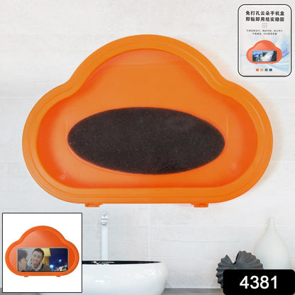 Hand interacting with a smartphone inside the orange waterproof mobile stand, demonstrating touch functionality.